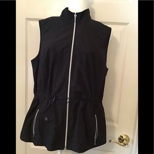 Chico’s NWOT size 2 golf vest.  Great style.